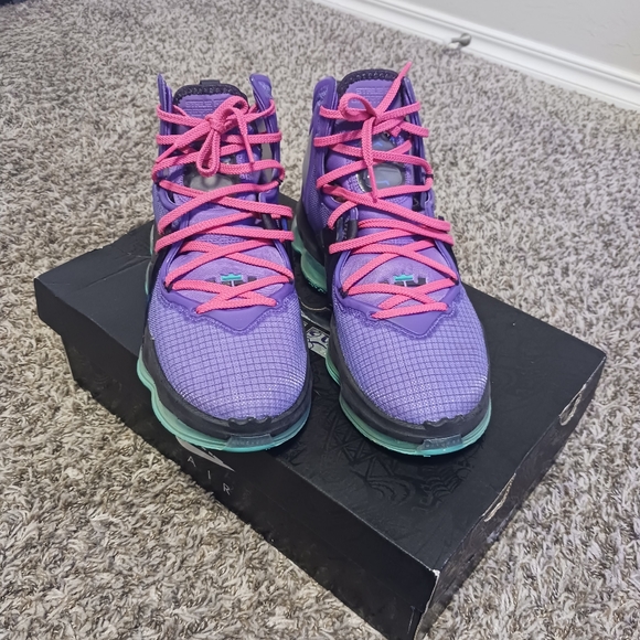 black and teal lebrons